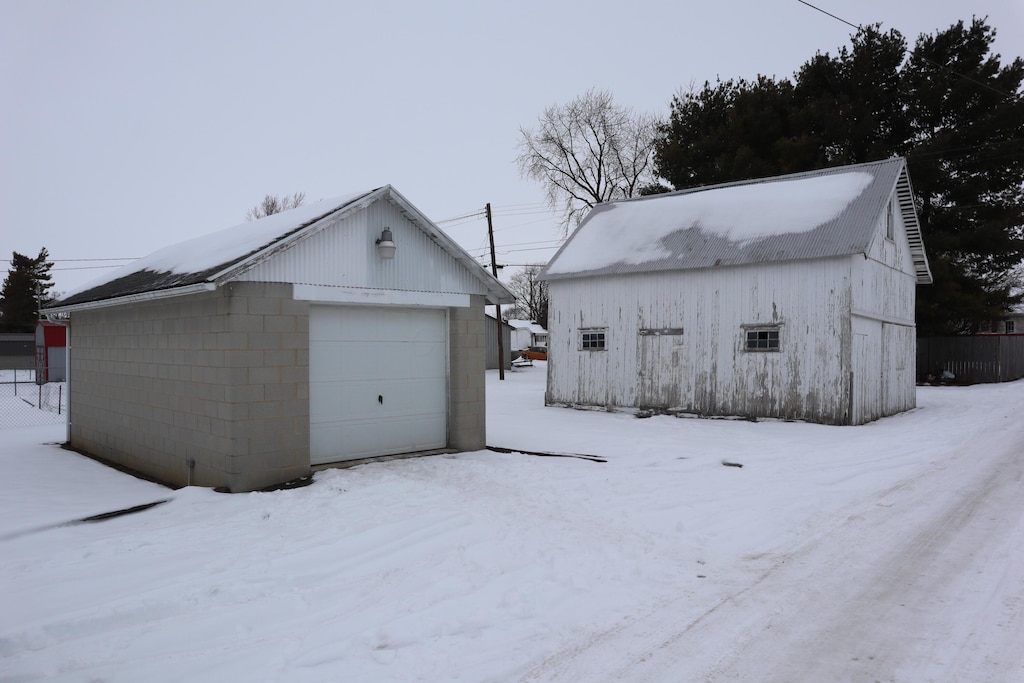 view of snow covered garage