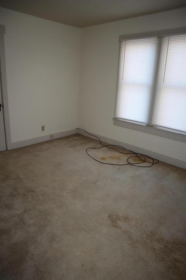 view of carpeted spare room