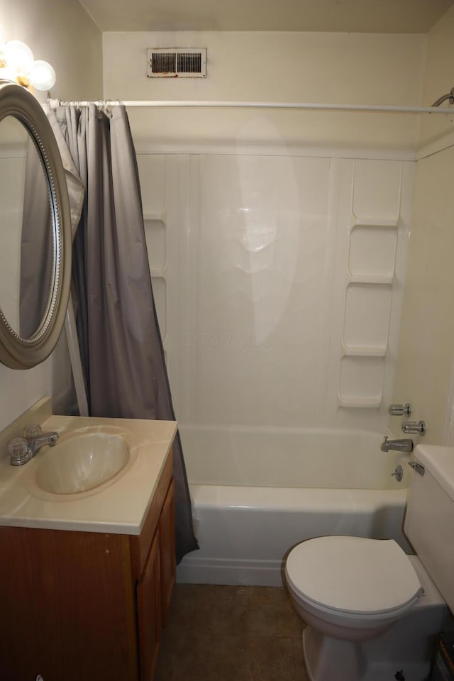 full bathroom featuring toilet, vanity, and shower / bathtub combination with curtain