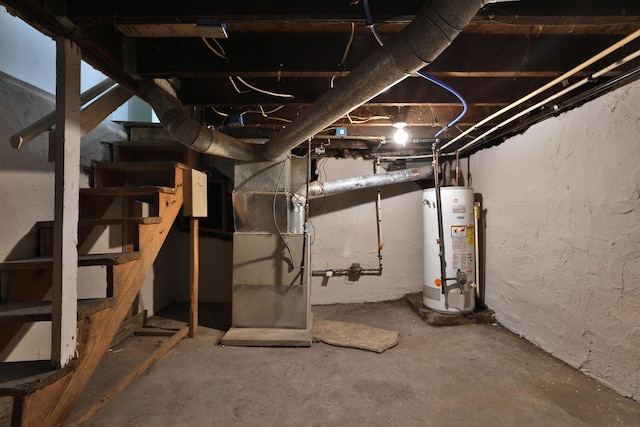 basement with heating unit and gas water heater