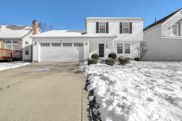 view of front of home with a garage