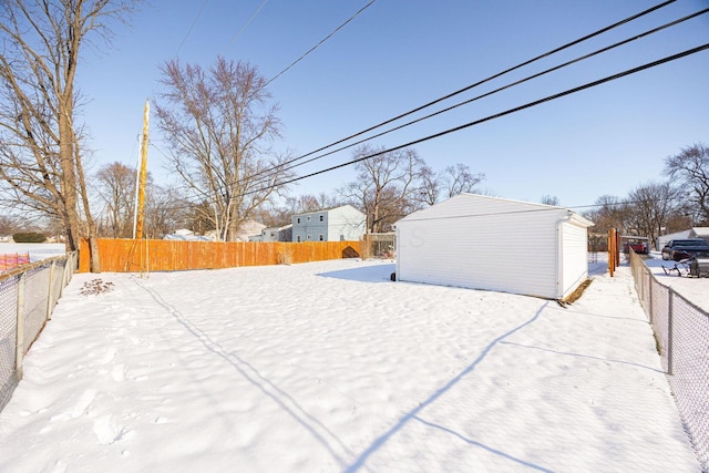 view of yard covered in snow