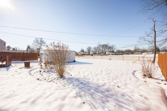 view of yard covered in snow