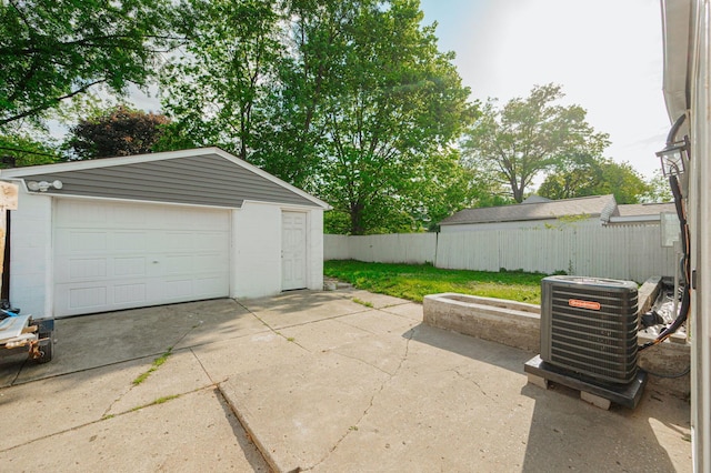 garage featuring central AC unit