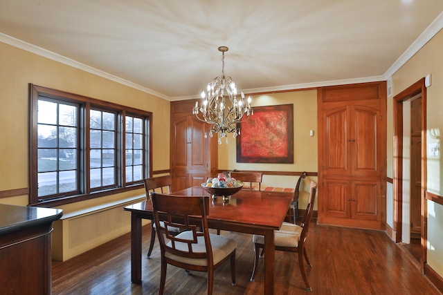 dining space featuring crown molding, a chandelier, and dark hardwood / wood-style flooring