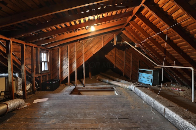 view of unfinished attic