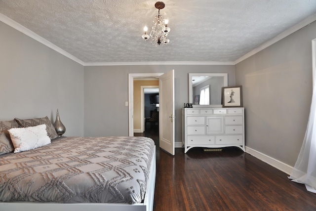 bedroom featuring ornamental molding, a textured ceiling, a notable chandelier, and dark hardwood / wood-style flooring