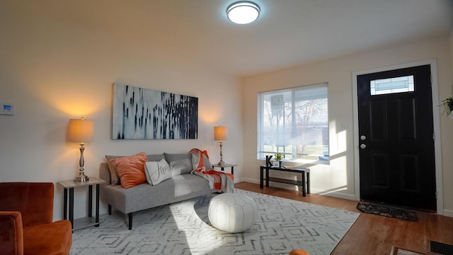 1807 Weiler Ave, Columbus, OH 43207 - living area with wood finished floors and baseboards