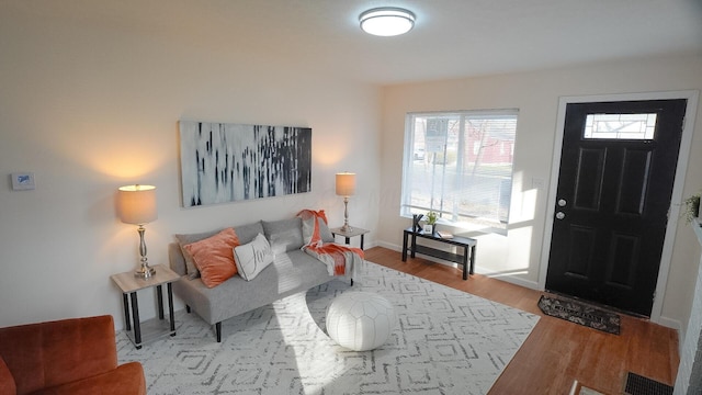 1807 Weiler Ave, Columbus, OH 43207 - living room with wood finished floors and baseboards