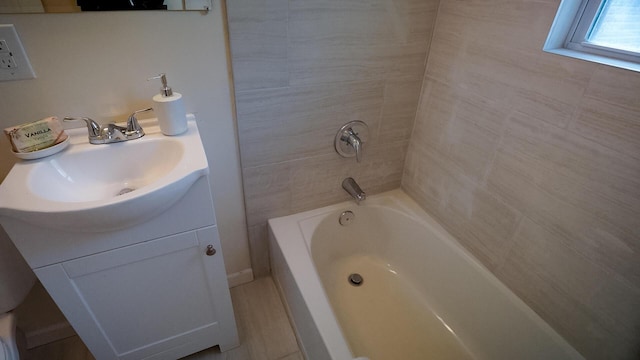 1807 Weiler Ave, Columbus, OH 43207 - bathroom featuring vanity and  shower combination