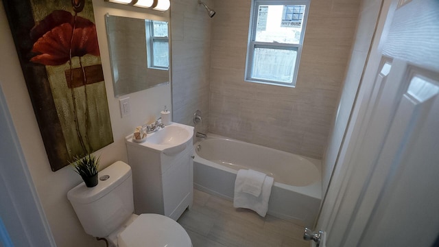 1807 Weiler Ave, Columbus, OH 43207 - full bath with toilet, vanity, tub / shower combination, and tile patterned floors