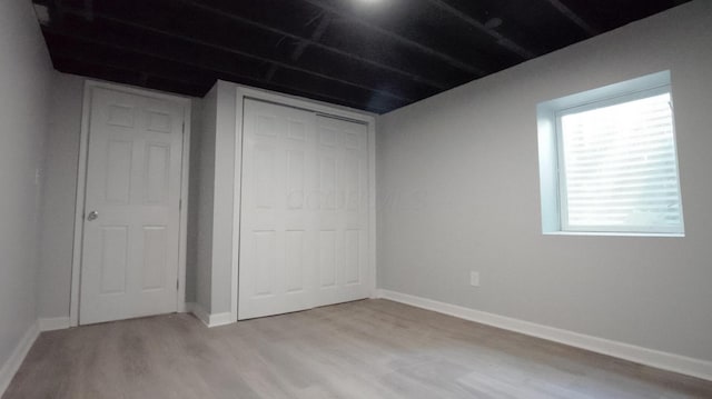 1807 Weiler Ave, Columbus, OH 43207 - unfurnished bedroom featuring light wood-style floors and a closet