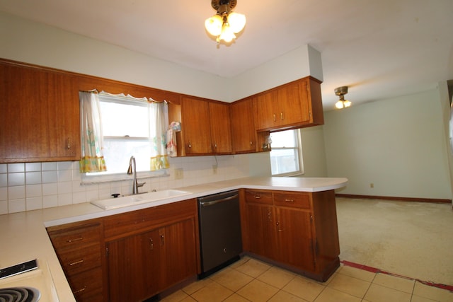 kitchen with light carpet, sink, backsplash, kitchen peninsula, and stainless steel dishwasher