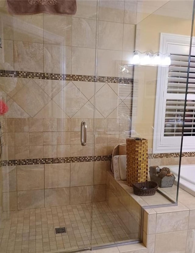 bathroom featuring a stall shower