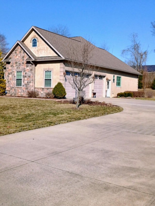 view of front of house featuring stucco siding, stone siding, concrete driveway, an attached garage, and a front yard