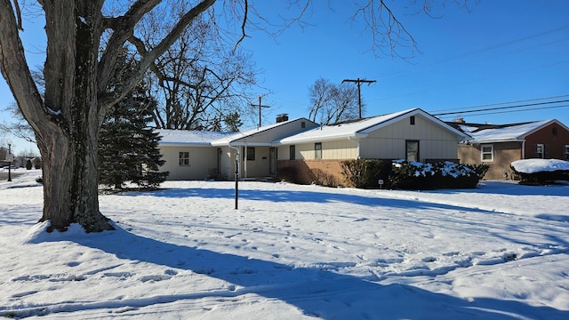 view of snow covered property