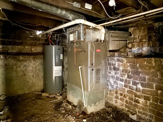 utility room featuring electric water heater