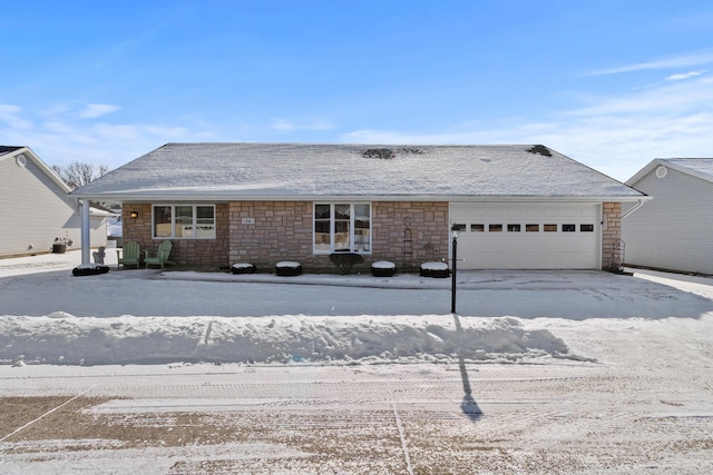 ranch-style home with a garage