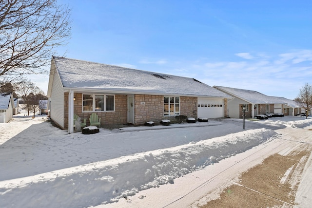 single story home featuring a garage