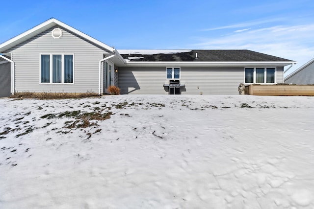 view of snow covered property