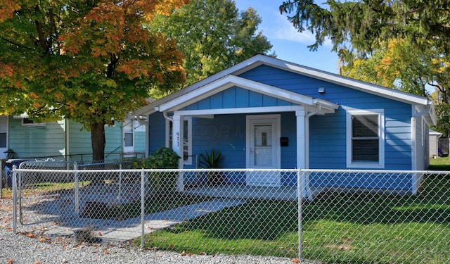 bungalow with a front yard