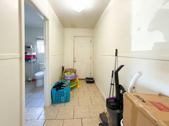 interior space with light tile patterned floors