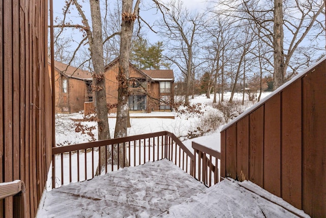 view of snow covered deck