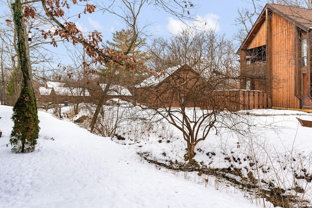 view of yard covered in snow