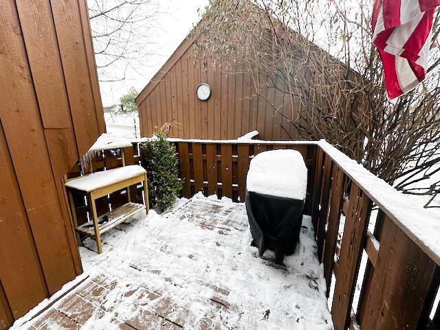 view of snow covered deck