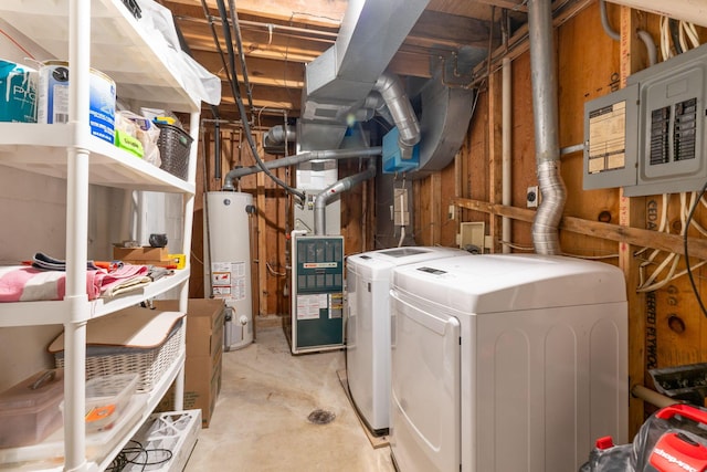 washroom featuring separate washer and dryer, electric panel, heating unit, and water heater