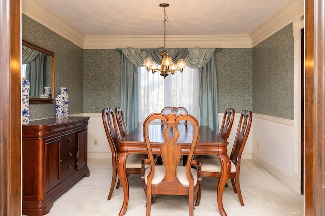 carpeted dining room with a notable chandelier and crown molding