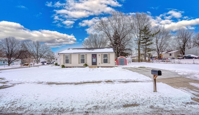 manufactured / mobile home featuring an outbuilding and a shed