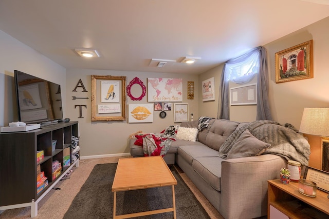 living area with baseboards and carpet floors