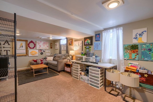 living area with carpet and baseboards