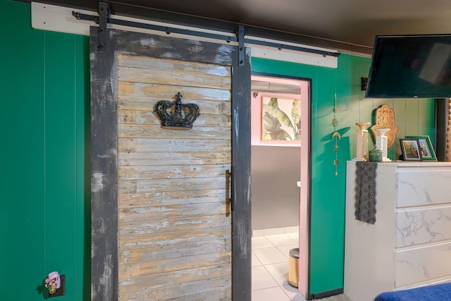 interior space featuring a barn door