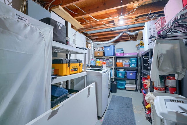 clothes washing area with washer and dryer and laundry area