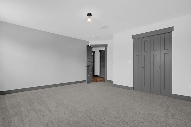 262 N 17th St, Columbus, OH 43203 - unfurnished bedroom featuring a closet and carpet