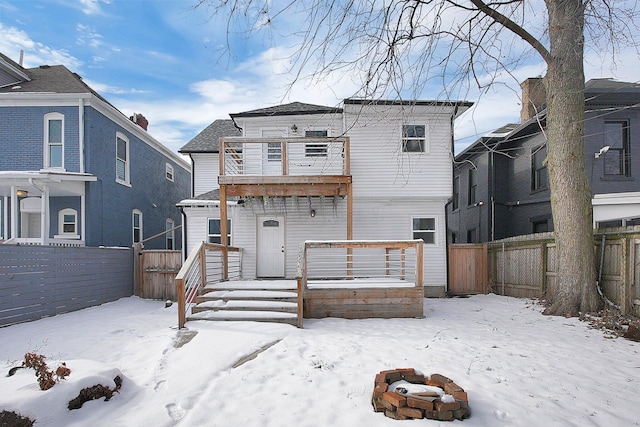 262 N 17th St, Columbus, OH 43203 - snow covered back of property featuring a fire pit and a deck