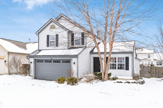 view of front property with a garage