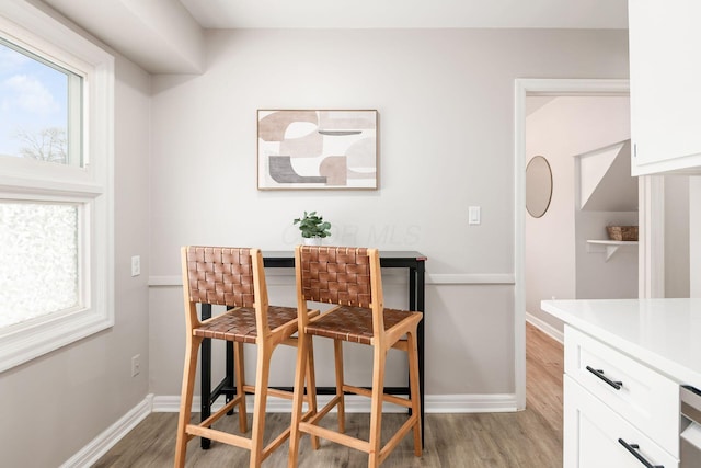 dining room featuring light hardwood / wood-style floors