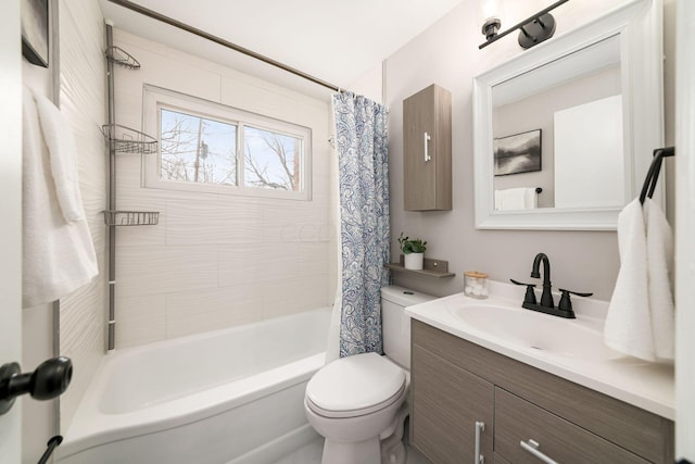 full bathroom featuring toilet, shower / tub combo with curtain, and vanity