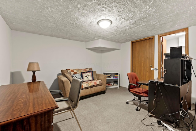 office space featuring a textured ceiling and light colored carpet