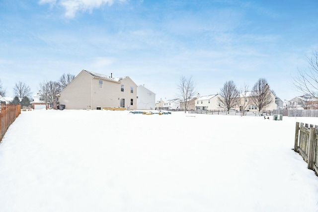 view of yard covered in snow