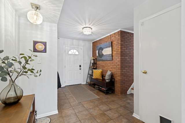 foyer with a notable chandelier