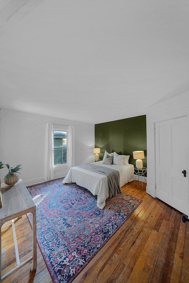 bedroom featuring hardwood / wood-style flooring