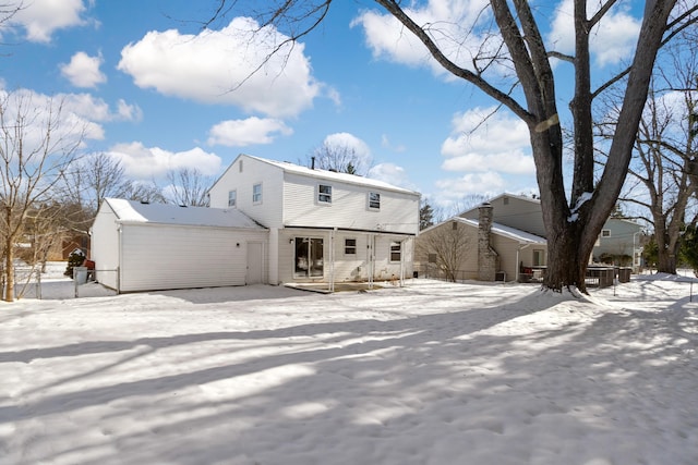 view of snow covered property