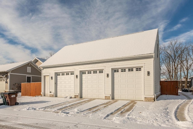 view of snow covered garage