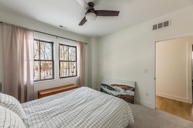 bedroom featuring ceiling fan and carpet flooring