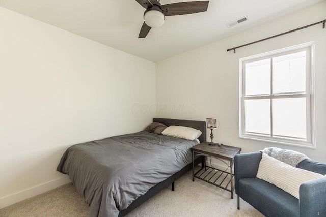 bedroom with light colored carpet and ceiling fan