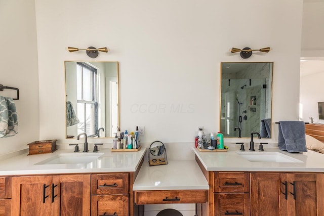 bathroom with vanity and walk in shower